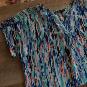 Blue, teal, and pink short sleeve top